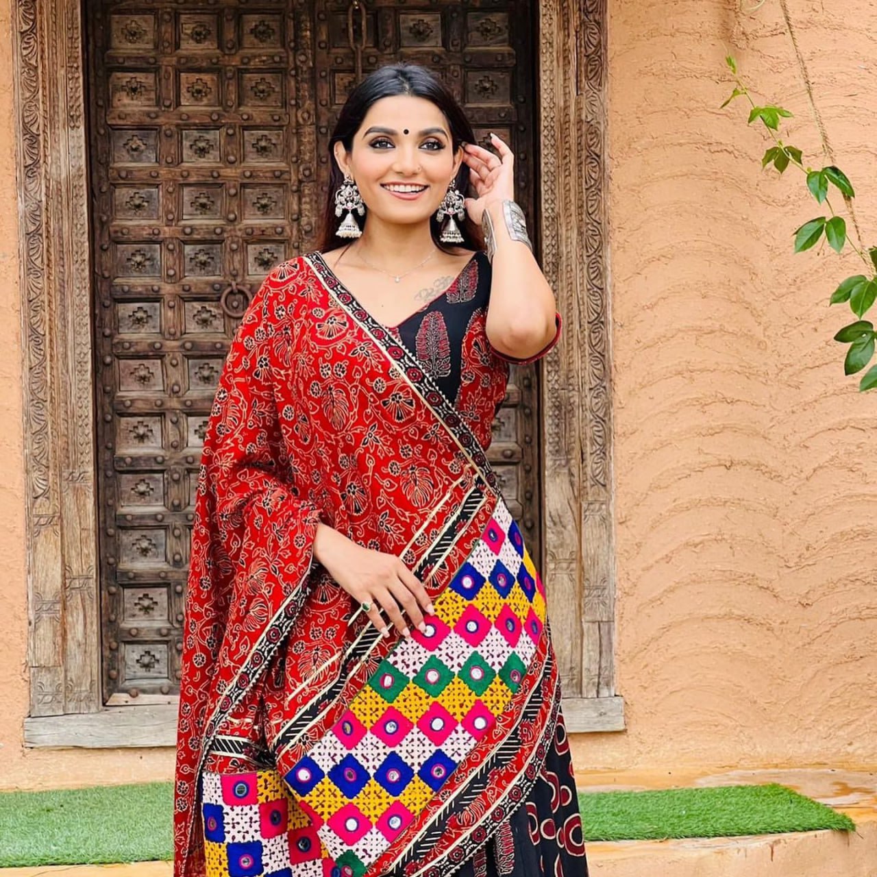 Royal Rajasthani Red & Black Mirrorwork Bandhani Drape Lehenga Choli