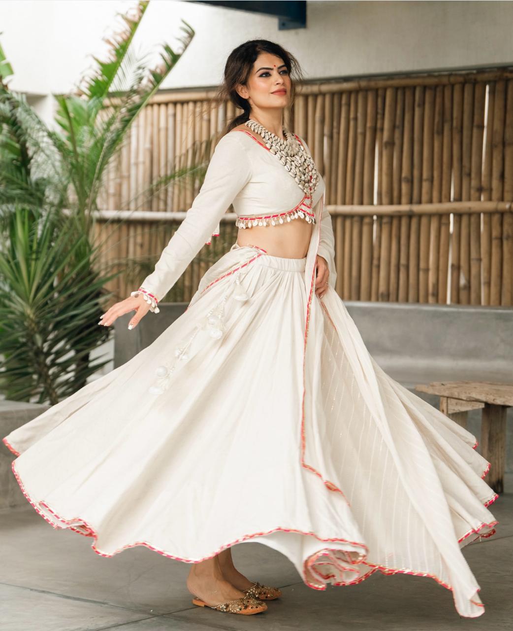 Lvory Grace: Ethereal Chaniya Choli with Subtle PinkΒ Highlights