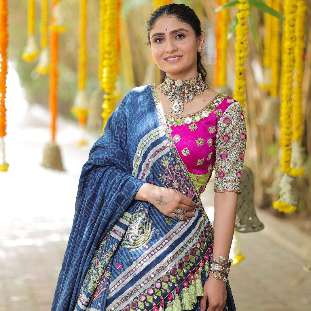 Elegance in Every Twirl Navy Blue Festive Charm Lehenga Choli