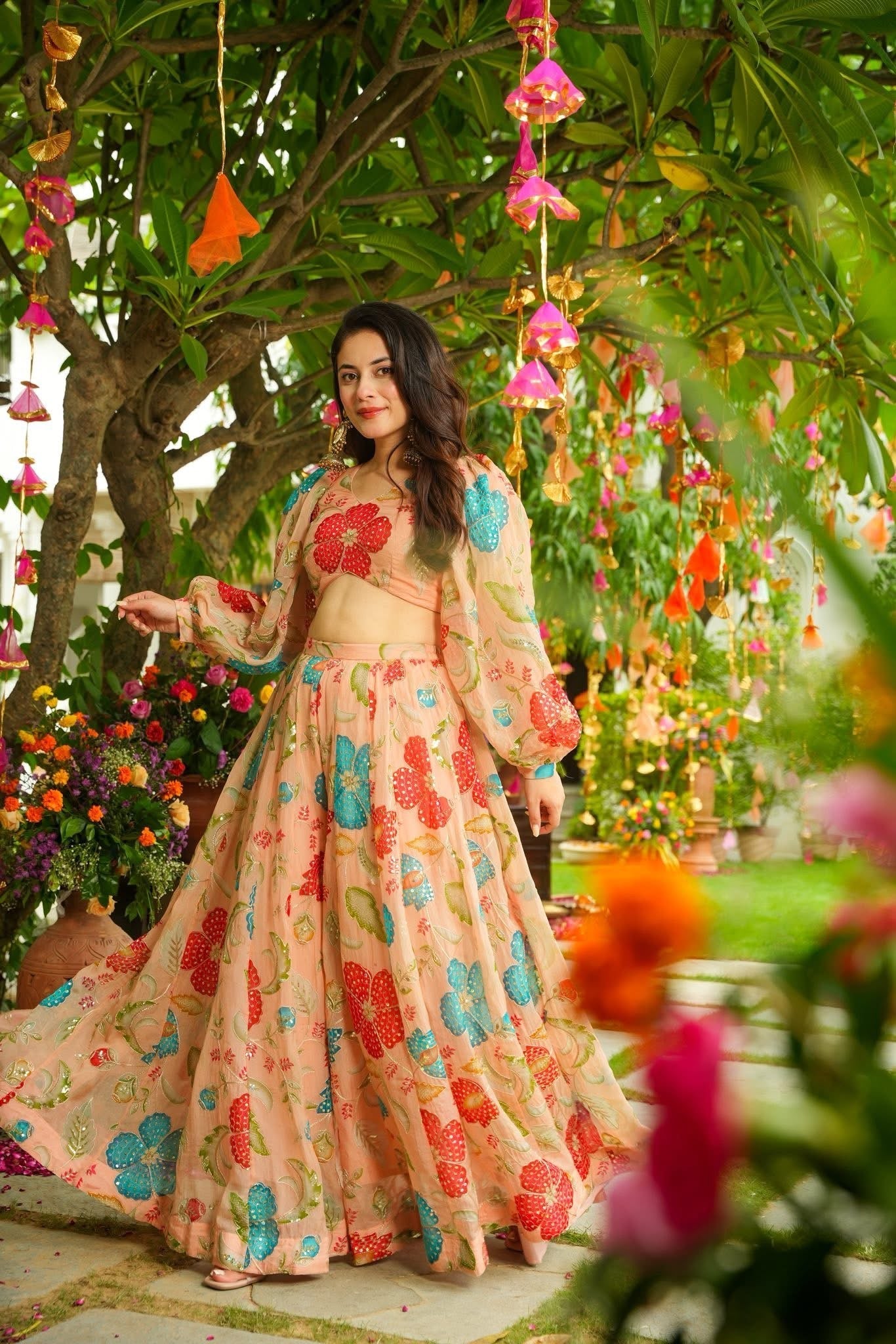 Aarohi Peach Floral Organza Lehenga with Crop Top & Cape Sleeves