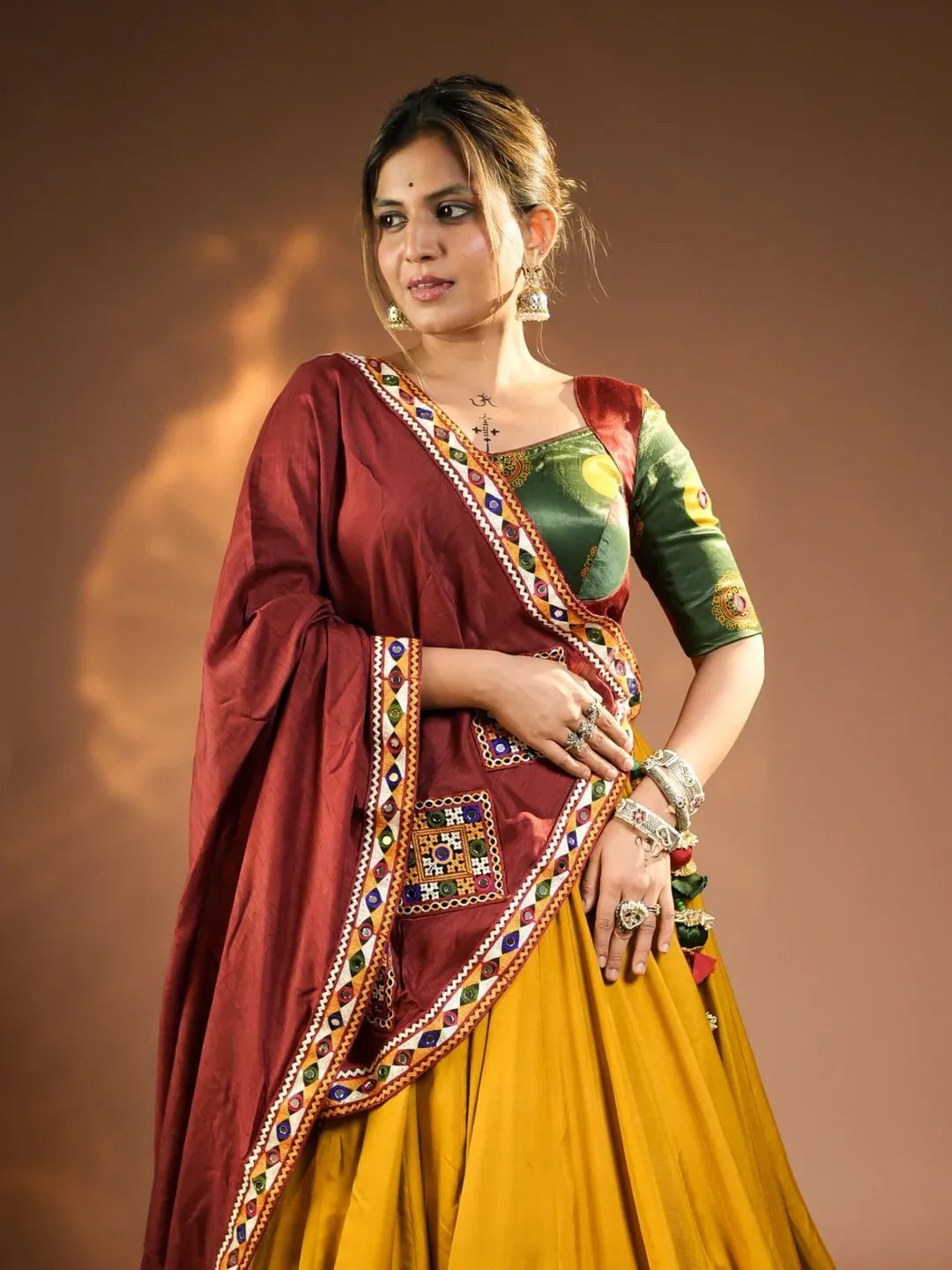 Rajmayuri Mustard Maroon Kutchi Mirror Work Festive Lehenga Set