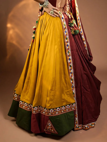 Rajmayuri Mustard Maroon Kutchi Mirror Work Festive Lehenga Set