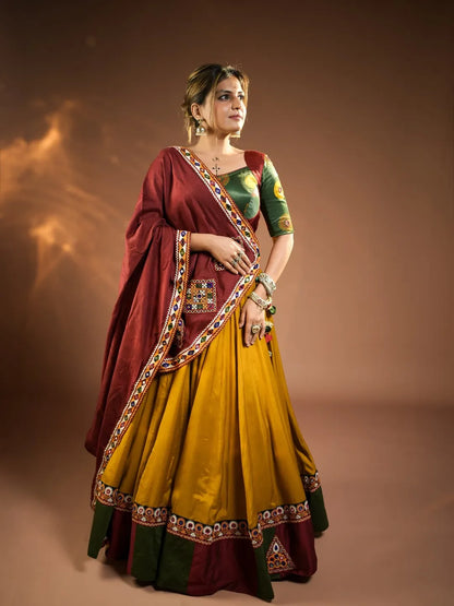 Rajmayuri Mustard Maroon Kutchi Mirror Work Festive Lehenga Set