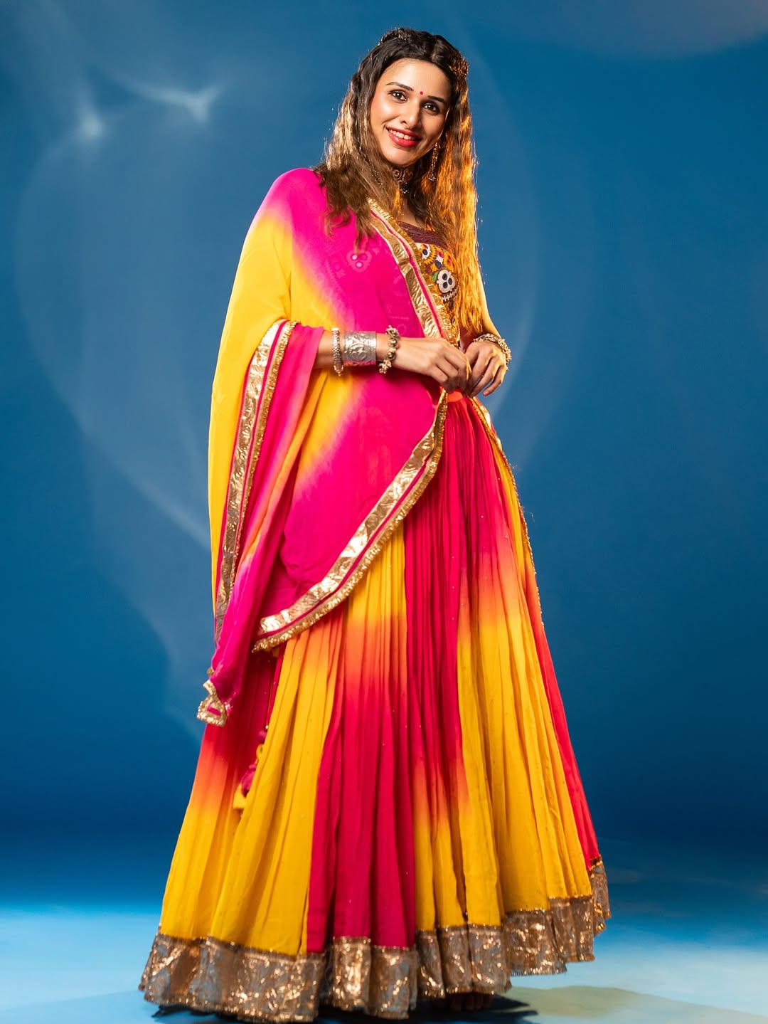 Aarohi Vibrant Georgette Mirror Work Navratri Lehenga Choli