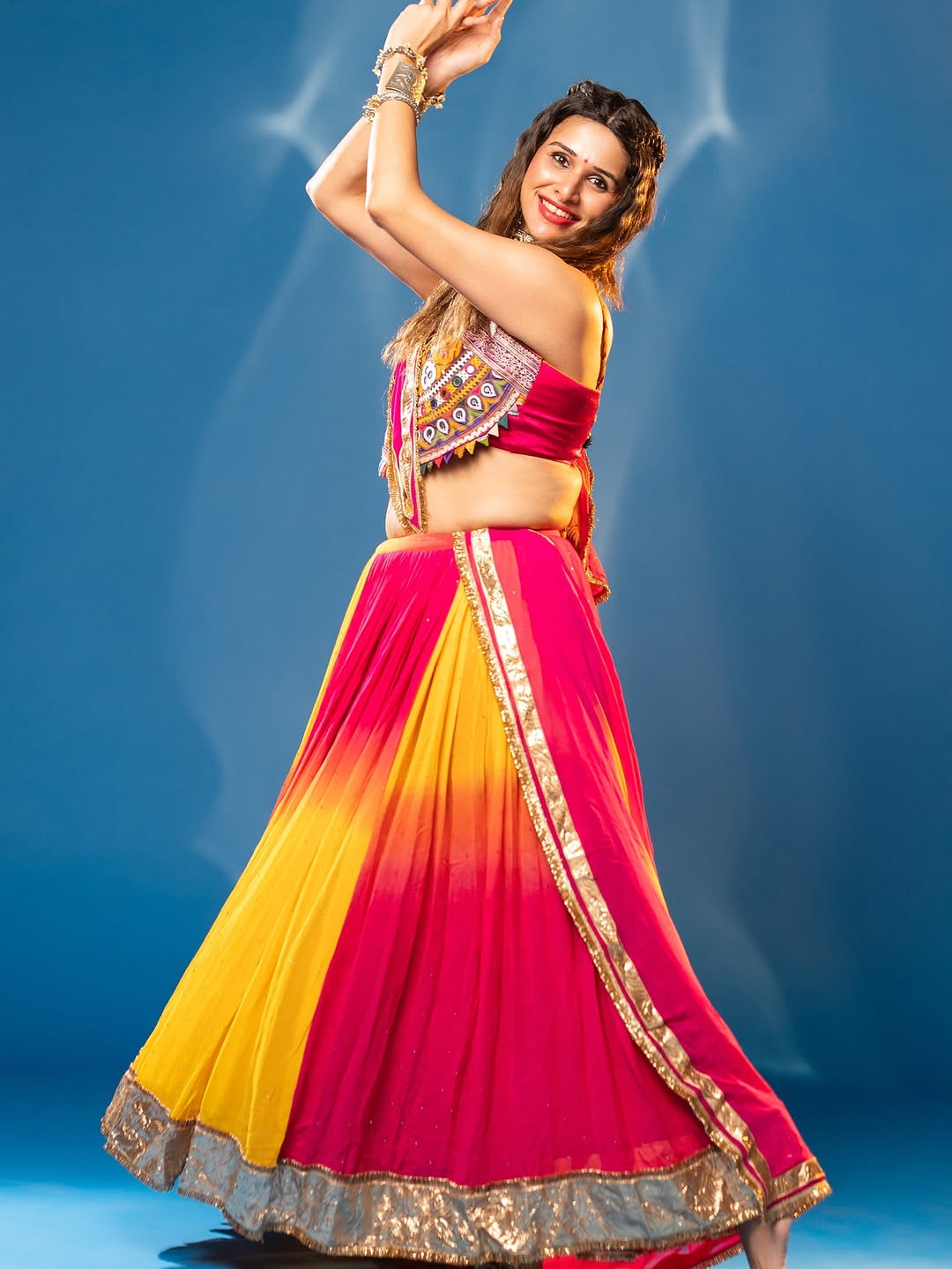 Aarohi Vibrant Georgette Mirror Work Navratri Lehenga Choli