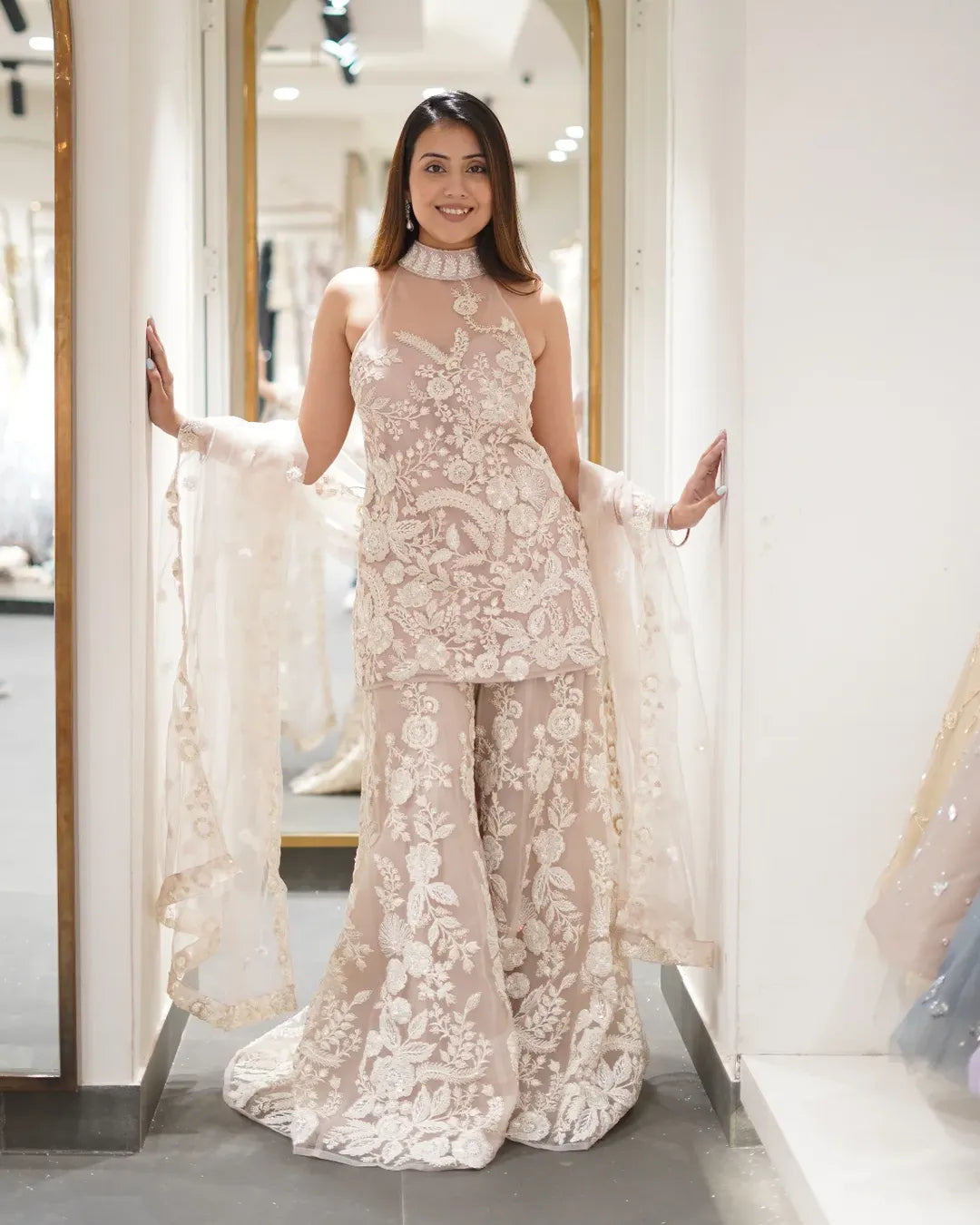 Ruhi Exquisite Net Fabric with Dori Work, Sequins And White Cutdana