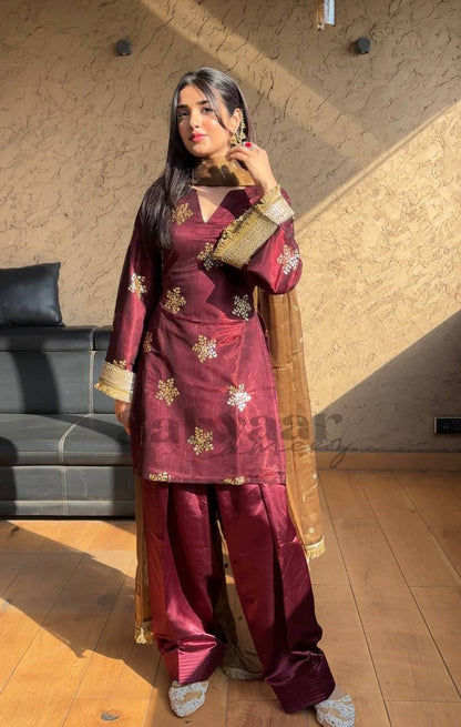 The Royal Ember Muse A Maroon Silk Draped in Gold Dust Elegance Suit