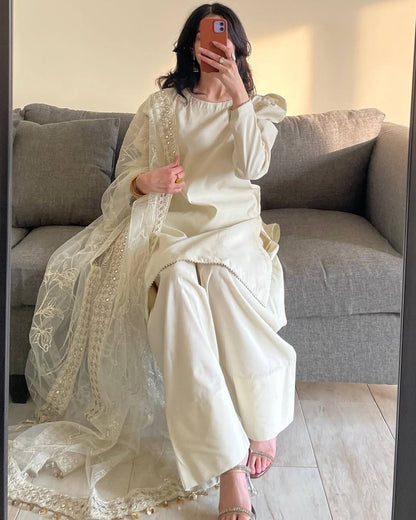 A Radiant Traditional Ensemble Festive Glamour Top With Farshi Salwar